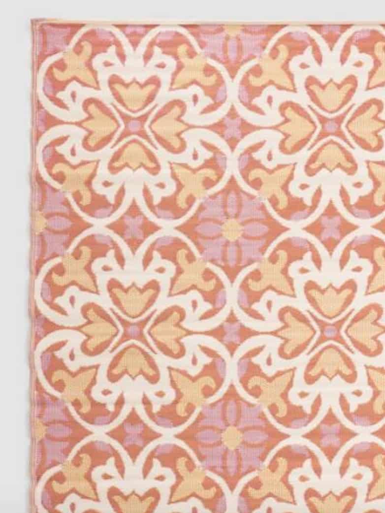 orange and pink medallian rug