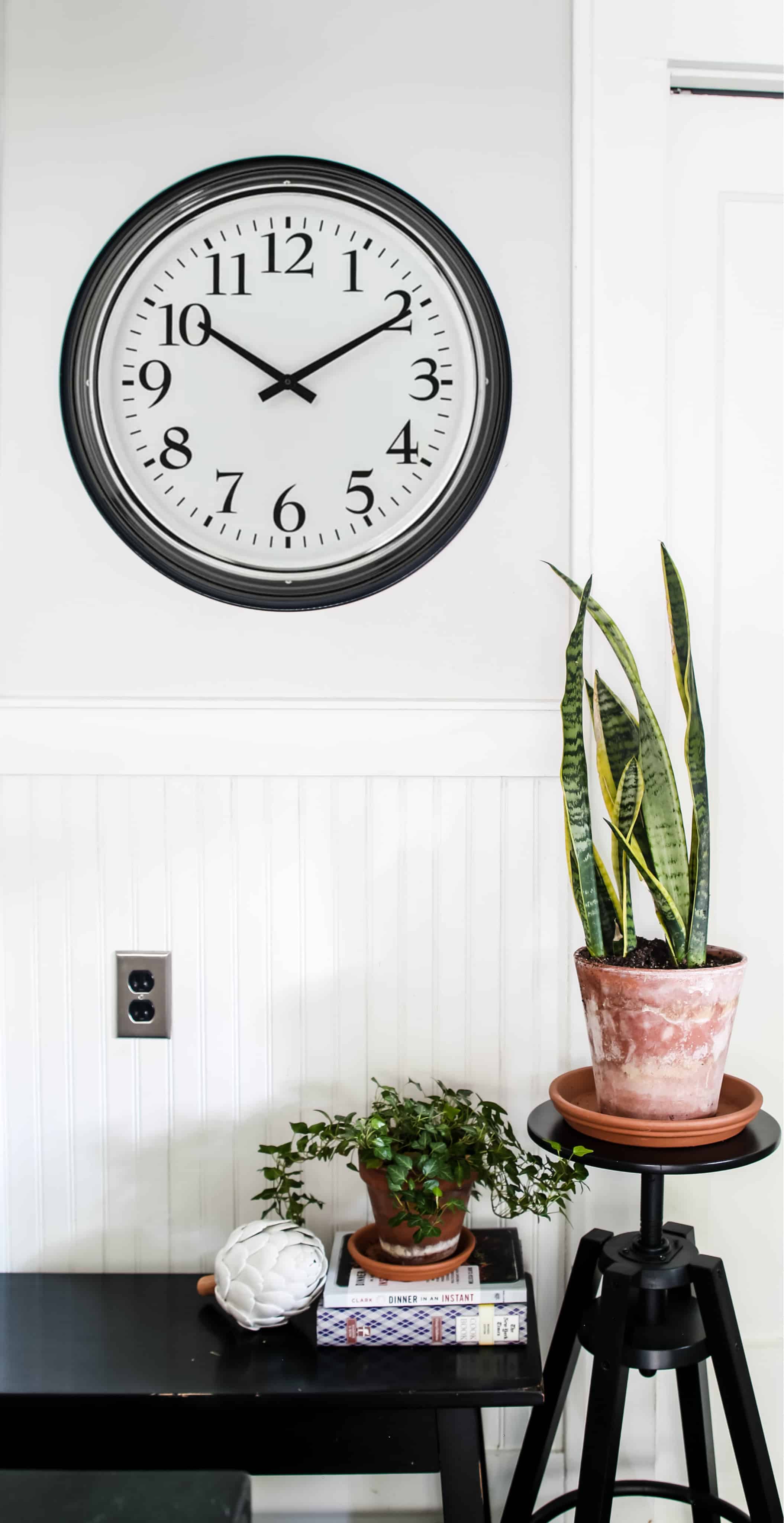 Clock hanging in the kitchen