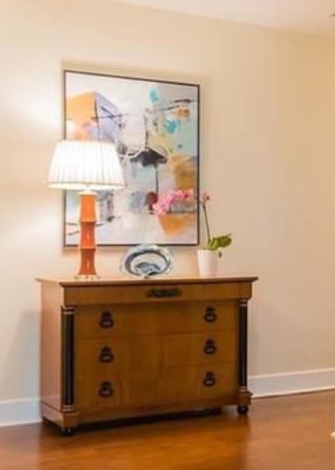 art hung above a dresser