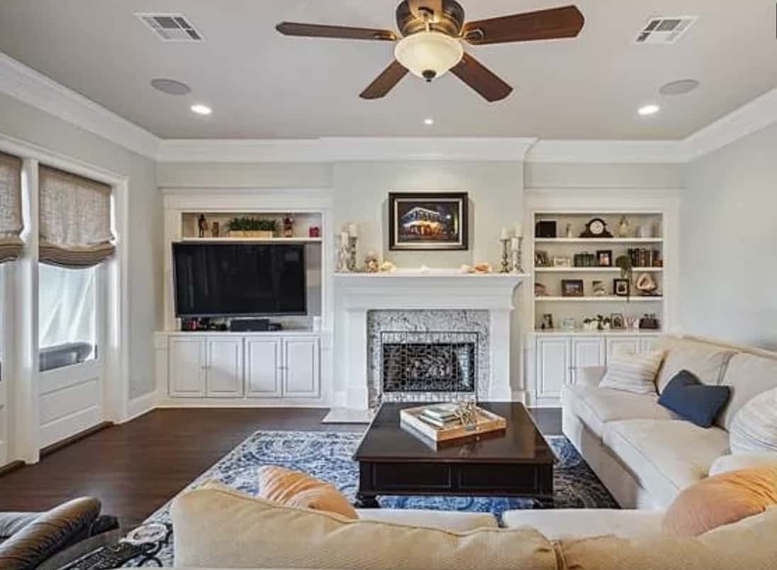 tv beside fireplace