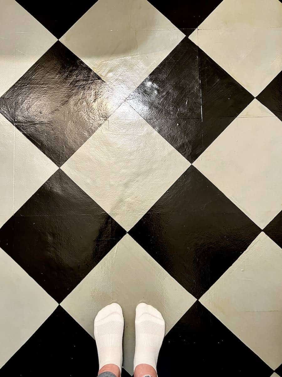 This image has an empty alt attribute; its file name is checkerboard-floors.jpeg