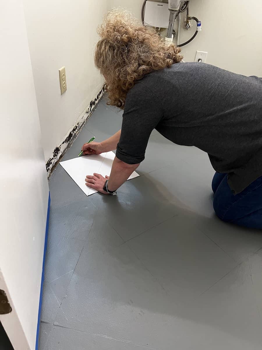 trace checkerboard floor with pencil