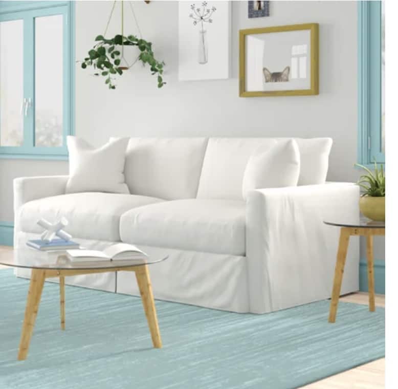 kia slip covered sofa