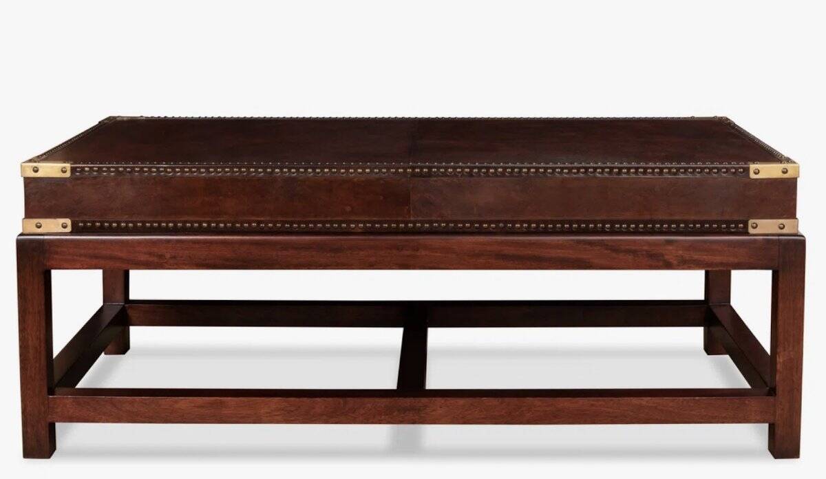 Campaign style coffee table with brass corner details